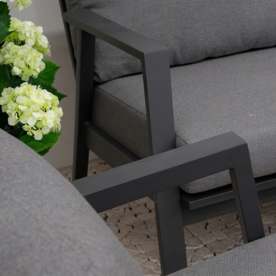 Close-up of the anthracite powder-coated aluminium arms of a Nova lounge set with grey cushions