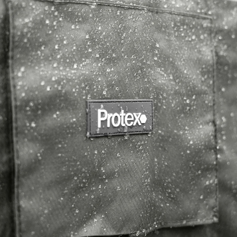 Rain beading on the water-repellent fabric of a Nova Protex furniture cover